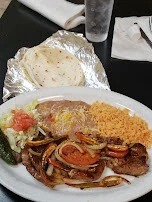 Carne Asada Aroz Y Frigoles Y Ensalada